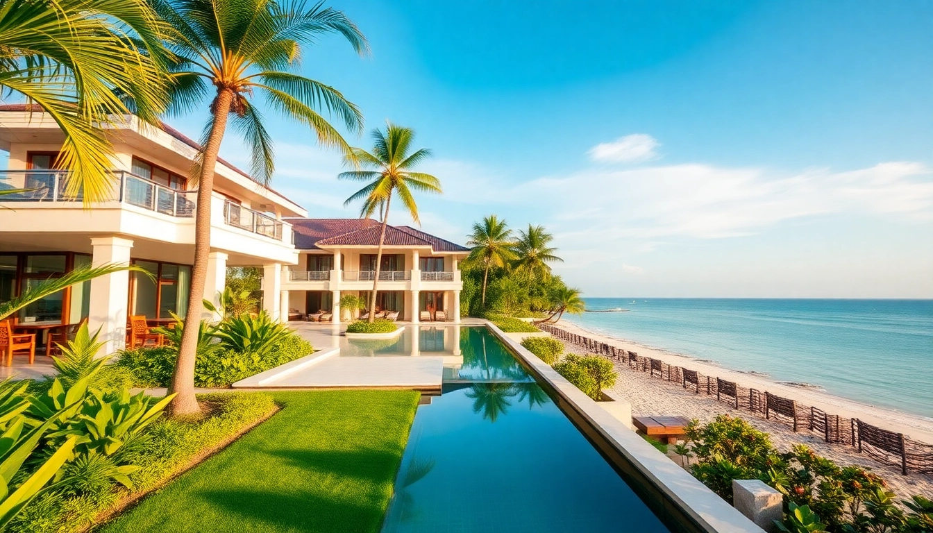Property management phuket services showcased with a serene beachfront villa surrounded by tropical foliage.
